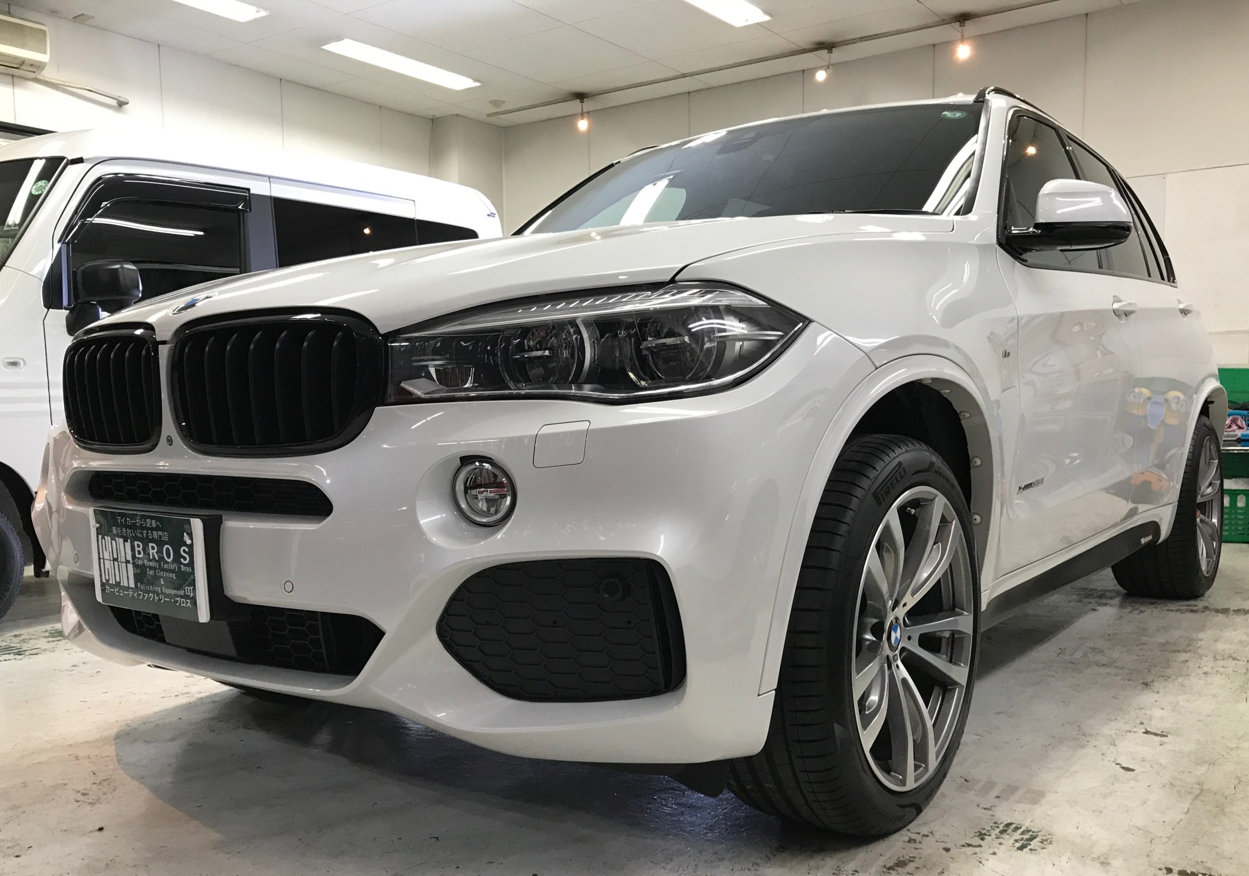 BMW・X5：MIYUKI施行写真：左バンパー部分