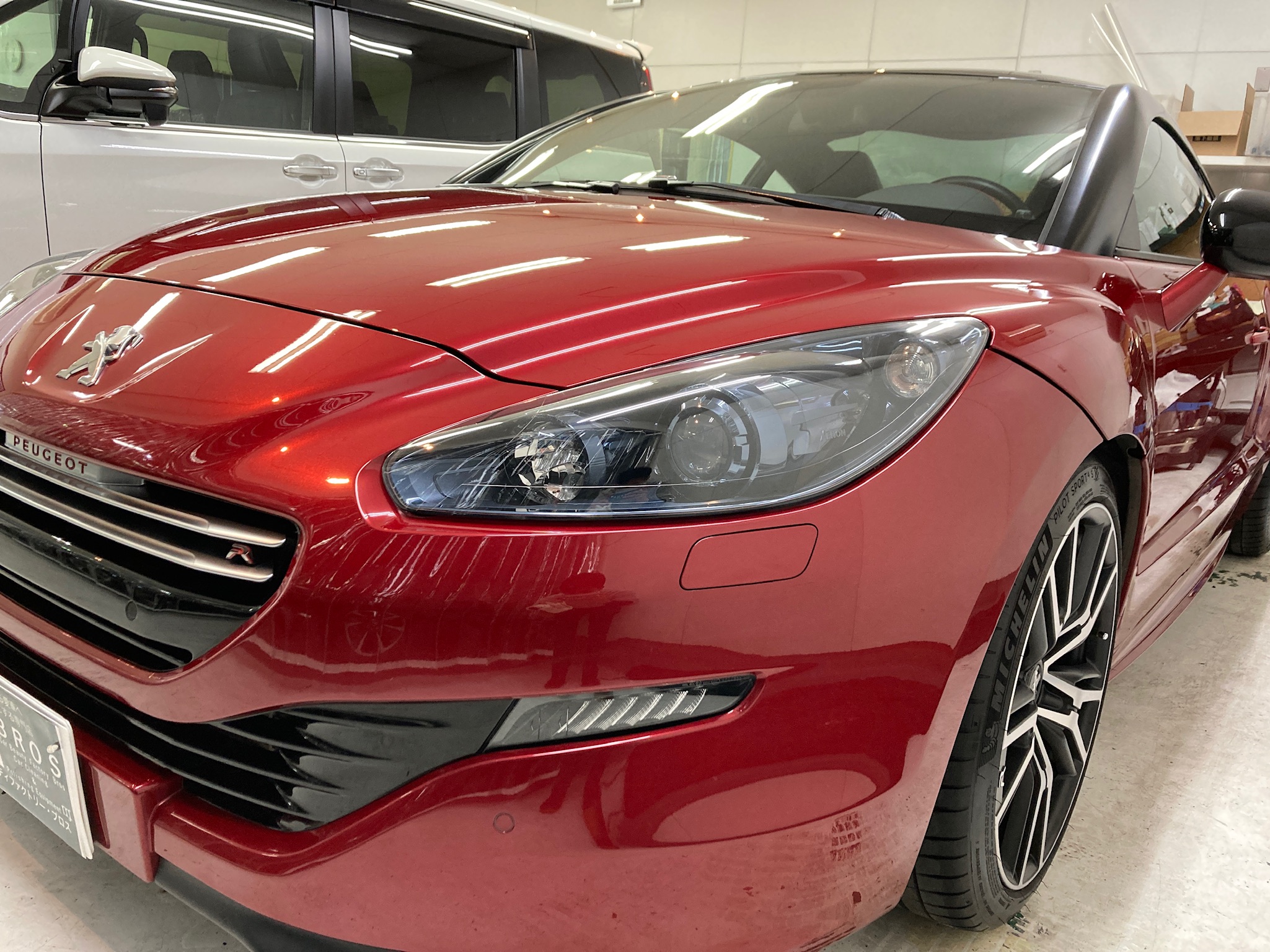 プジョー・RCZ:ガラスコーティングclass M施工完成写真：左バンパー