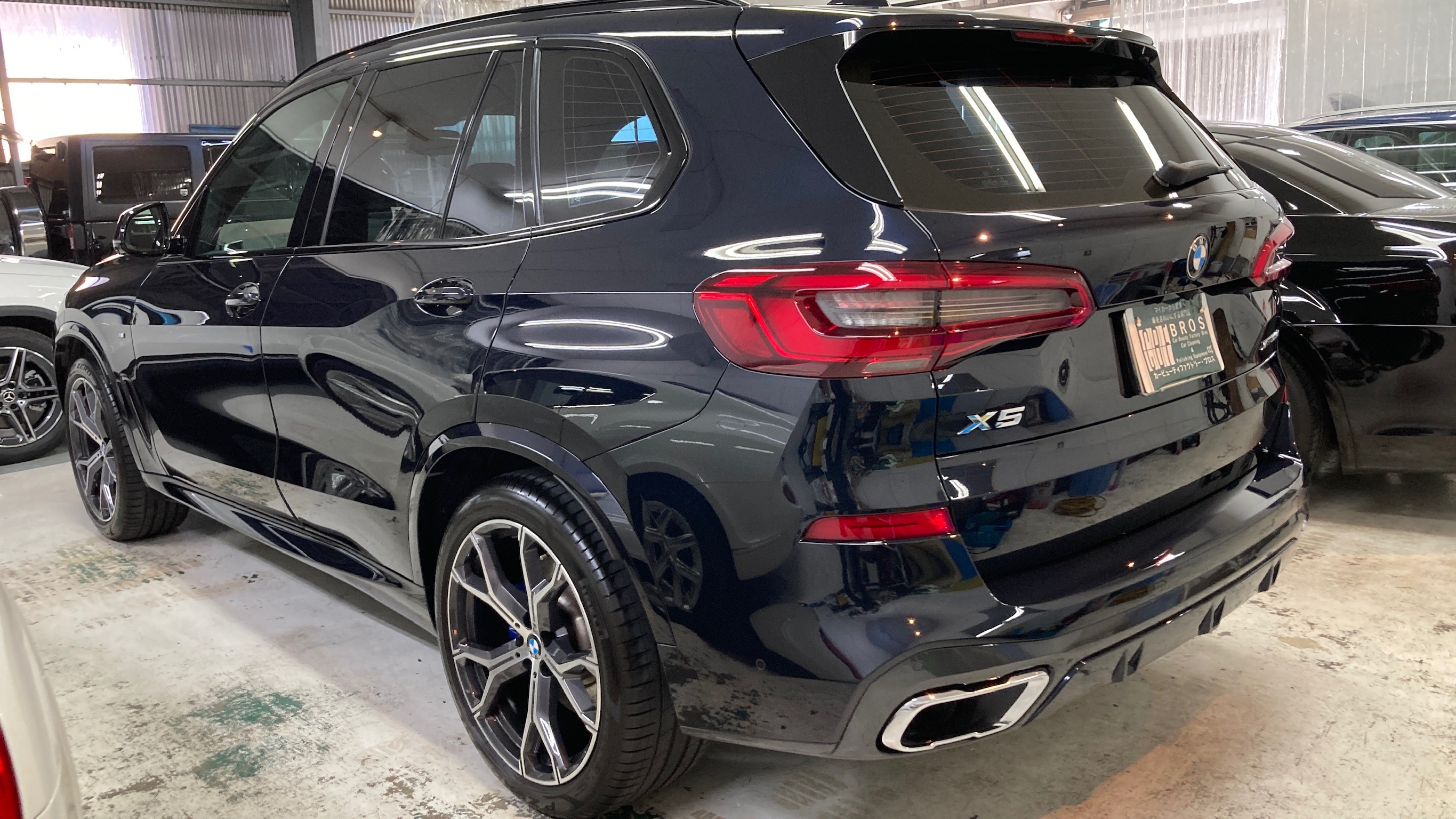 BMW・X5：リアルガラスコート クラスH完成写真：左リアバンパー