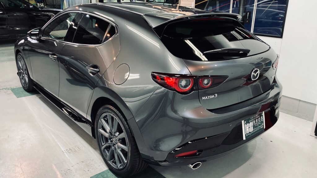 マツダ・MAZDA3：クラスM施工：完成写真：左リアバンパーの写真